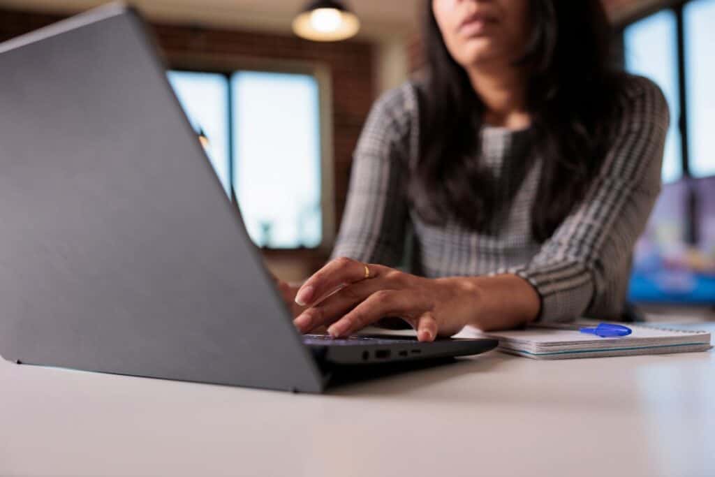 Female freelancer working on report at home