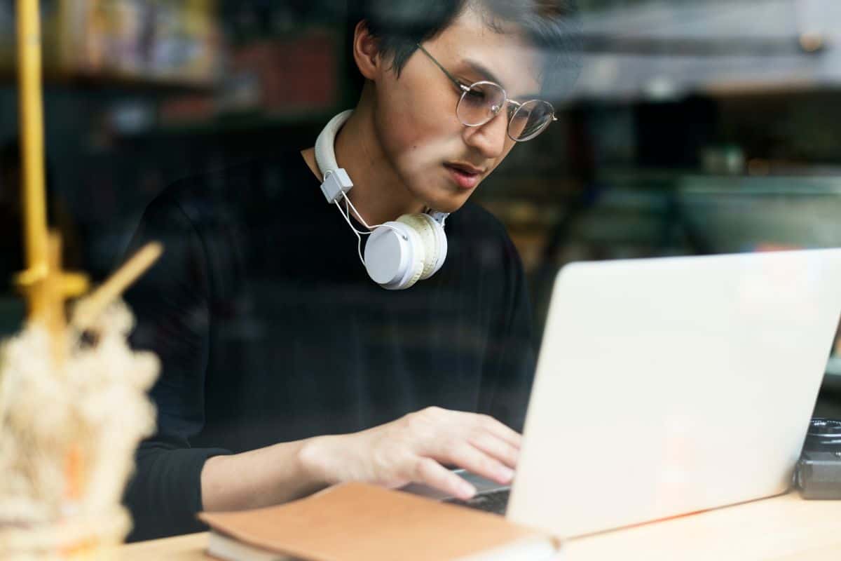 Young guy using laptop