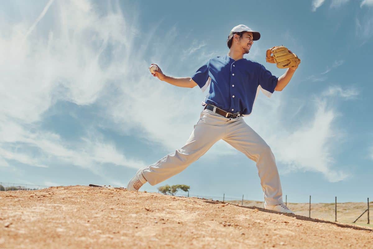 Sports baseball and pitching with man on field