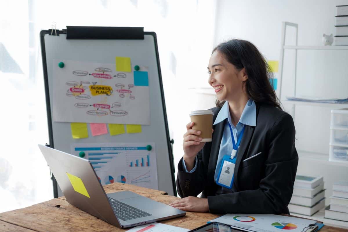 Asian businesswoman using laptop computer and working at office