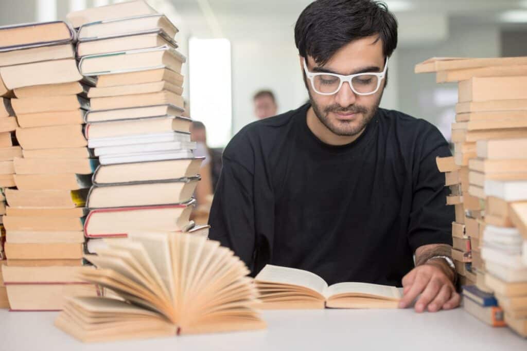 Middle eastern young student studying in college library