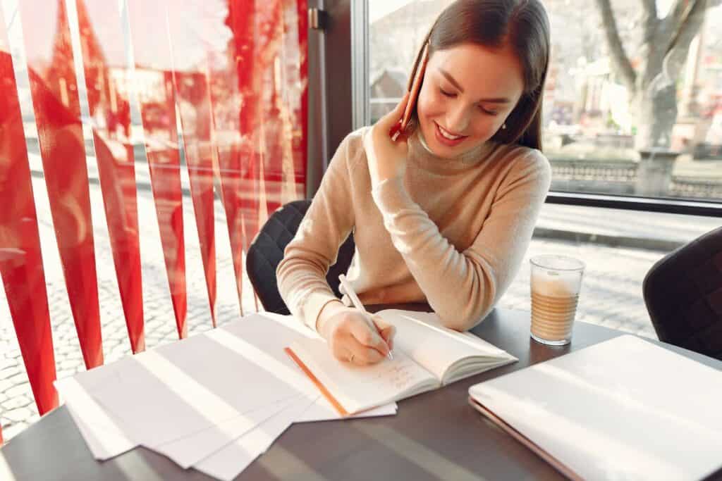 Businesswoman working in a cafe