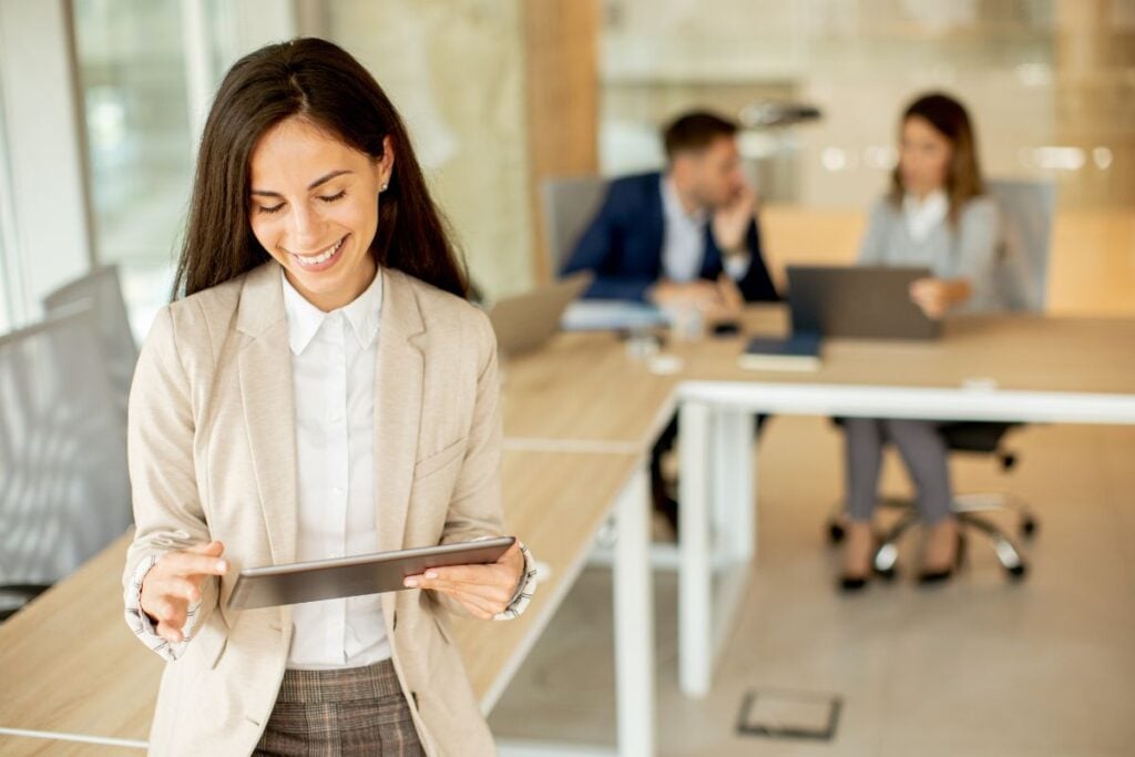Young woman with digital tablet in the office