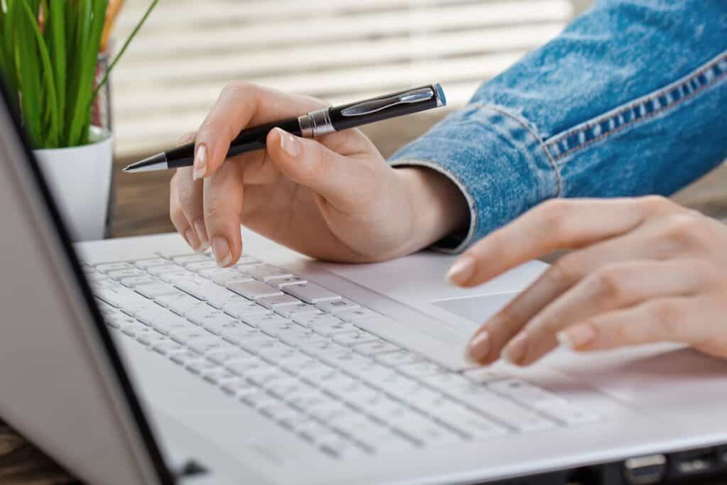
Business woman is working with business documents in the office