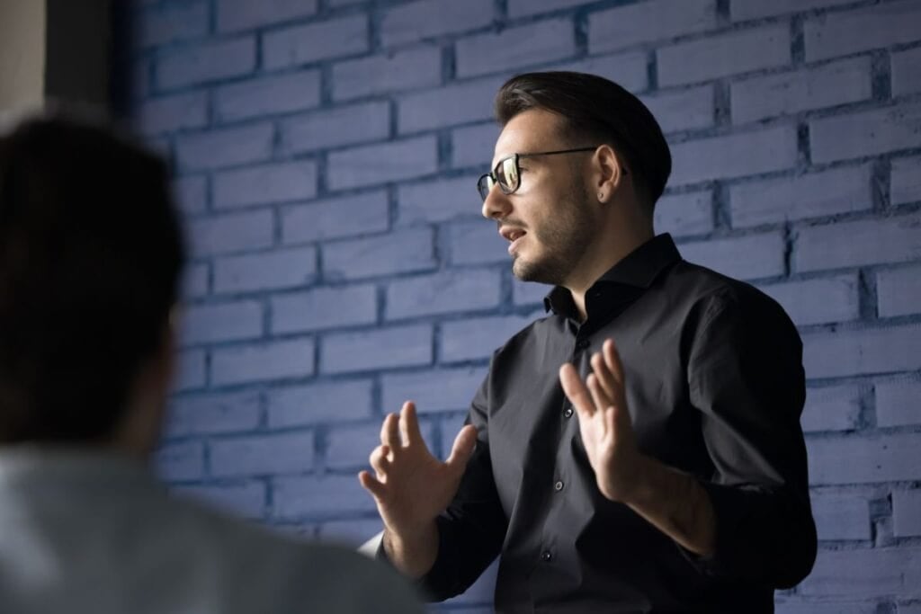 Smart engaged handsome business leader man in glasses