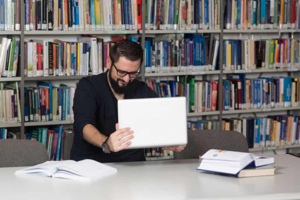 Angry student wants to break his laptop