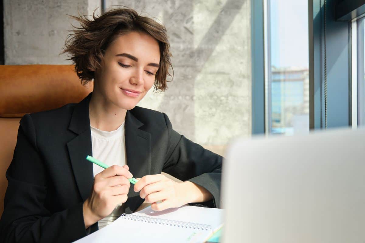 Portrait of corporate woman smiling with confidence