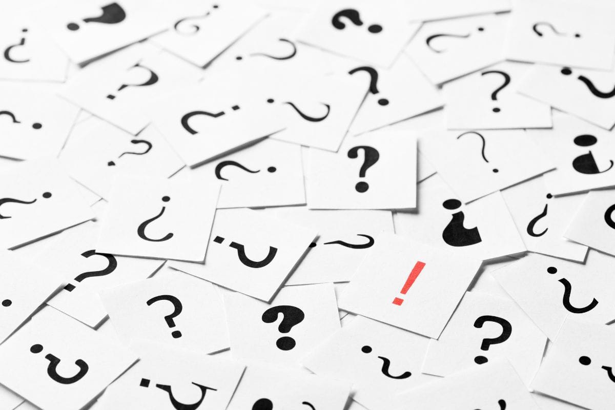 Pile of question mark signs scattered around