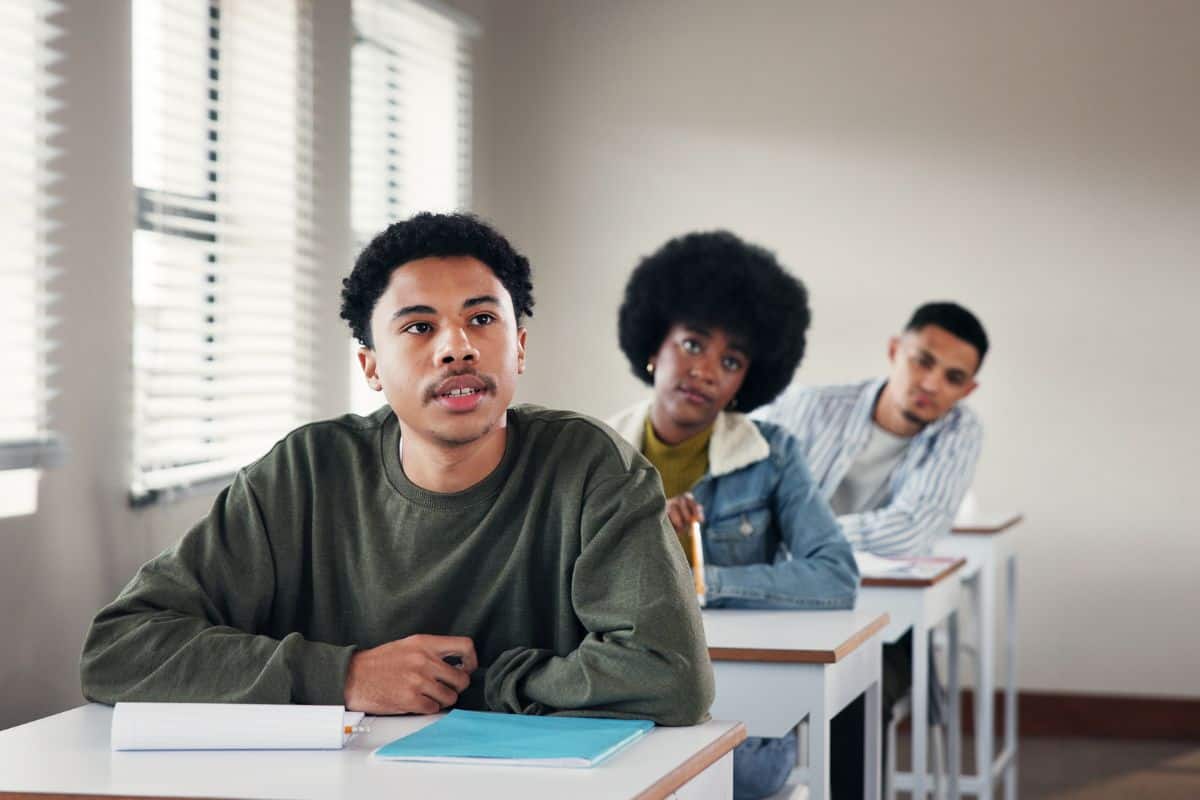 Education lesson and learning with teenager in classroom for high school