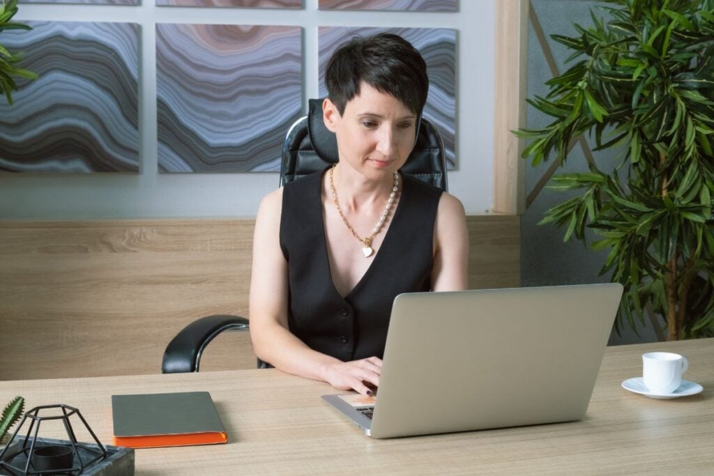Portrait of a business woman with short hair in an office 