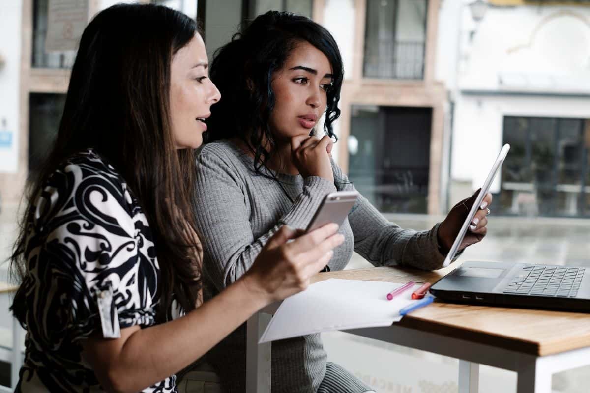 Business women working with their laptops in an office
