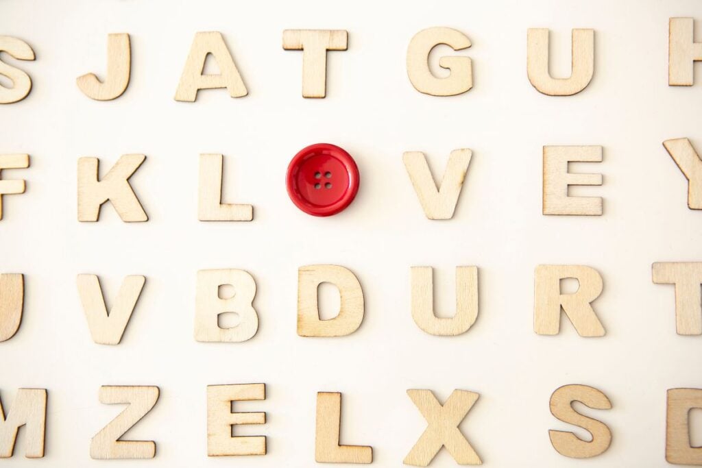 Wooden letters with the word love written on white background