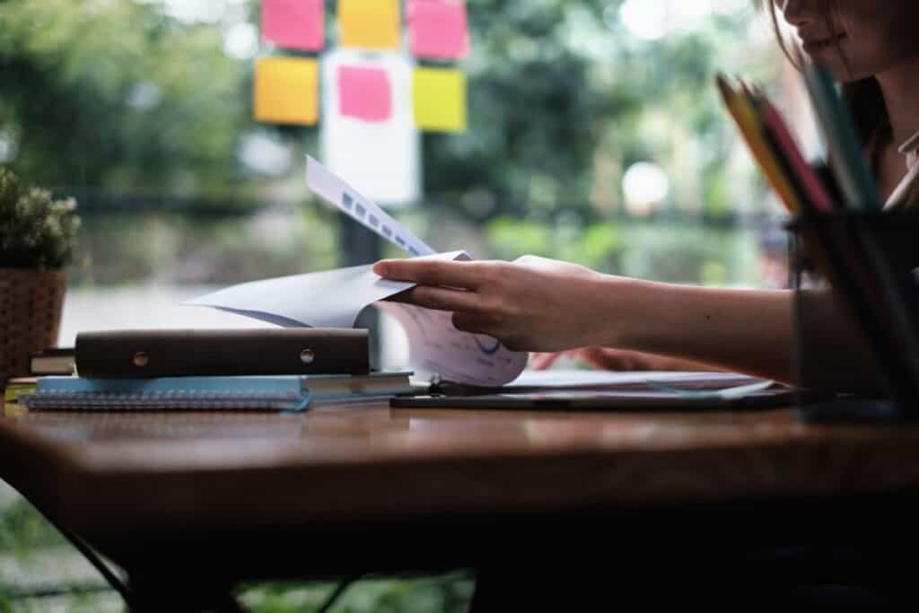 A businesswoman examines a financial chart