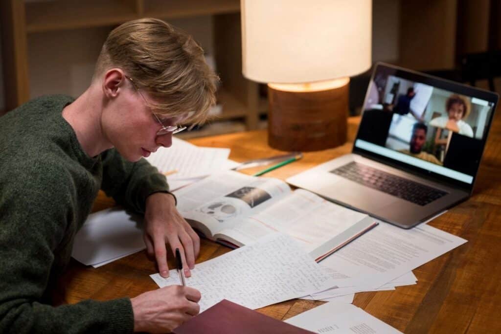 Young man learning in a virtual classroom