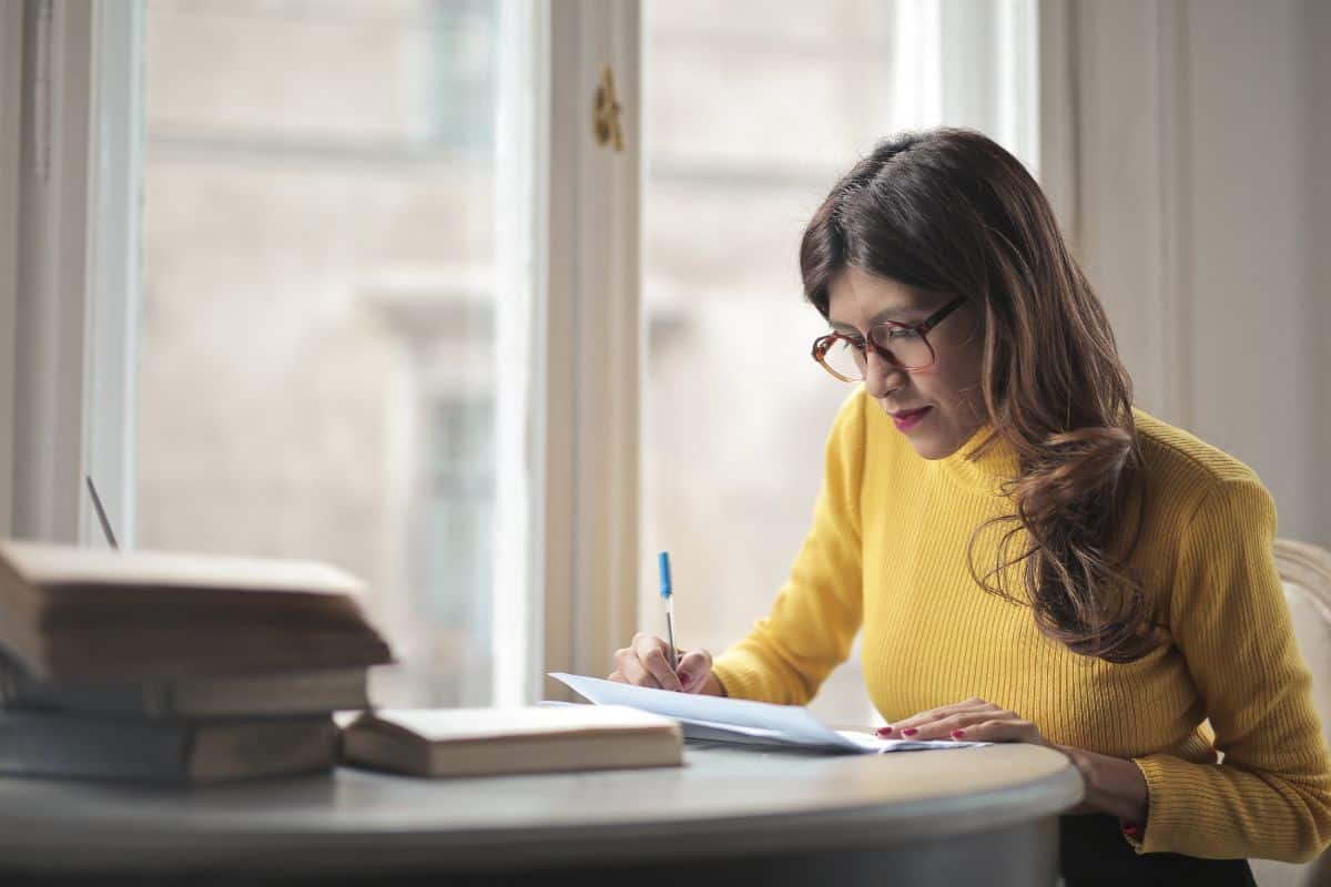 Young woman works on a school search