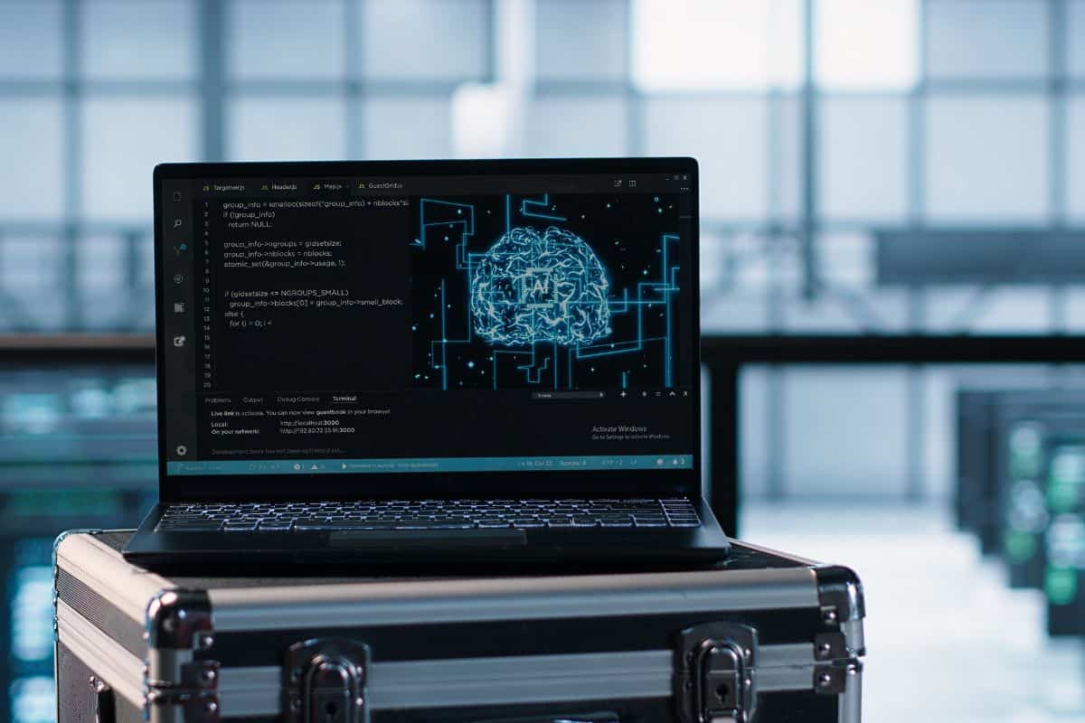 Laptop used by data center system administrators using ai tech close up