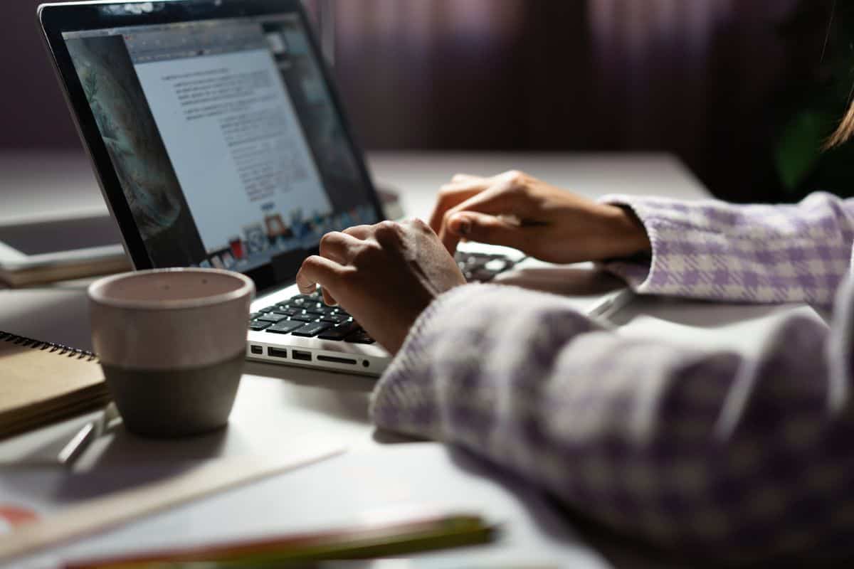 Woman uses a laptop while working on a new project