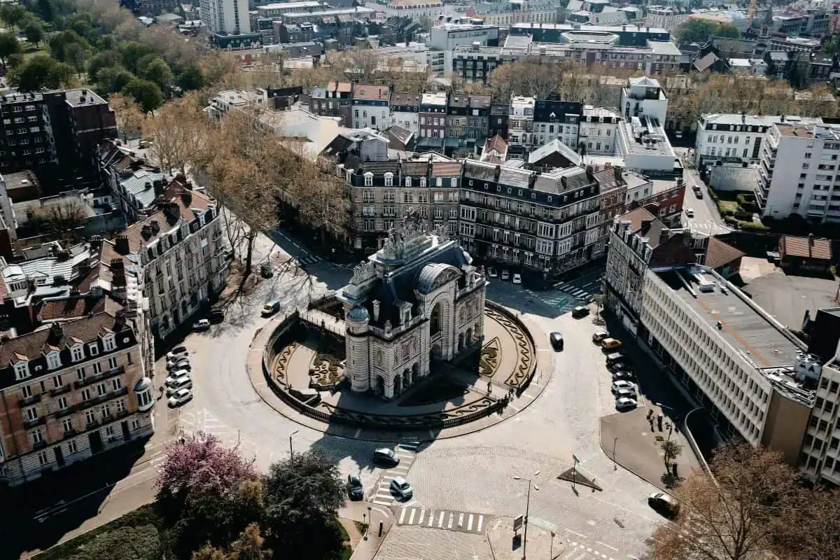 Aerial shot of a cityscape with a lot of cars