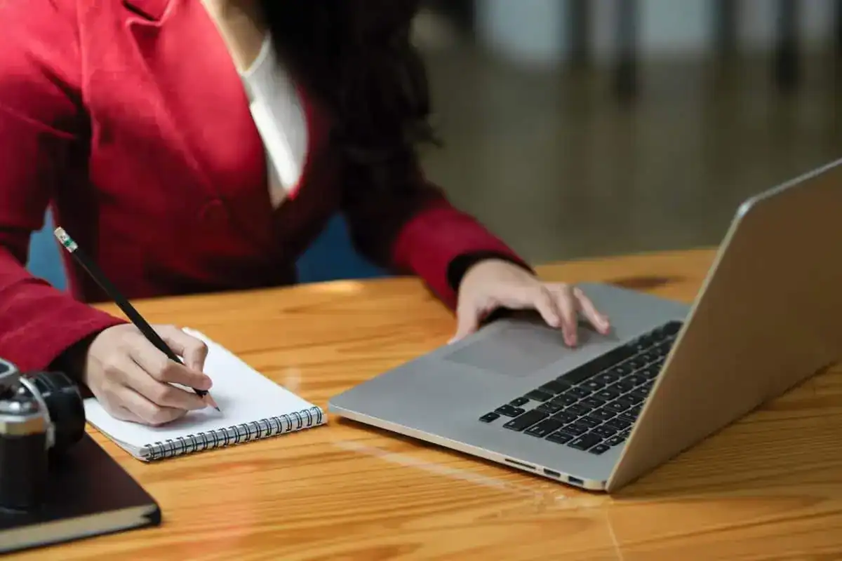 Cropped image of professional intelligent businesswoman working