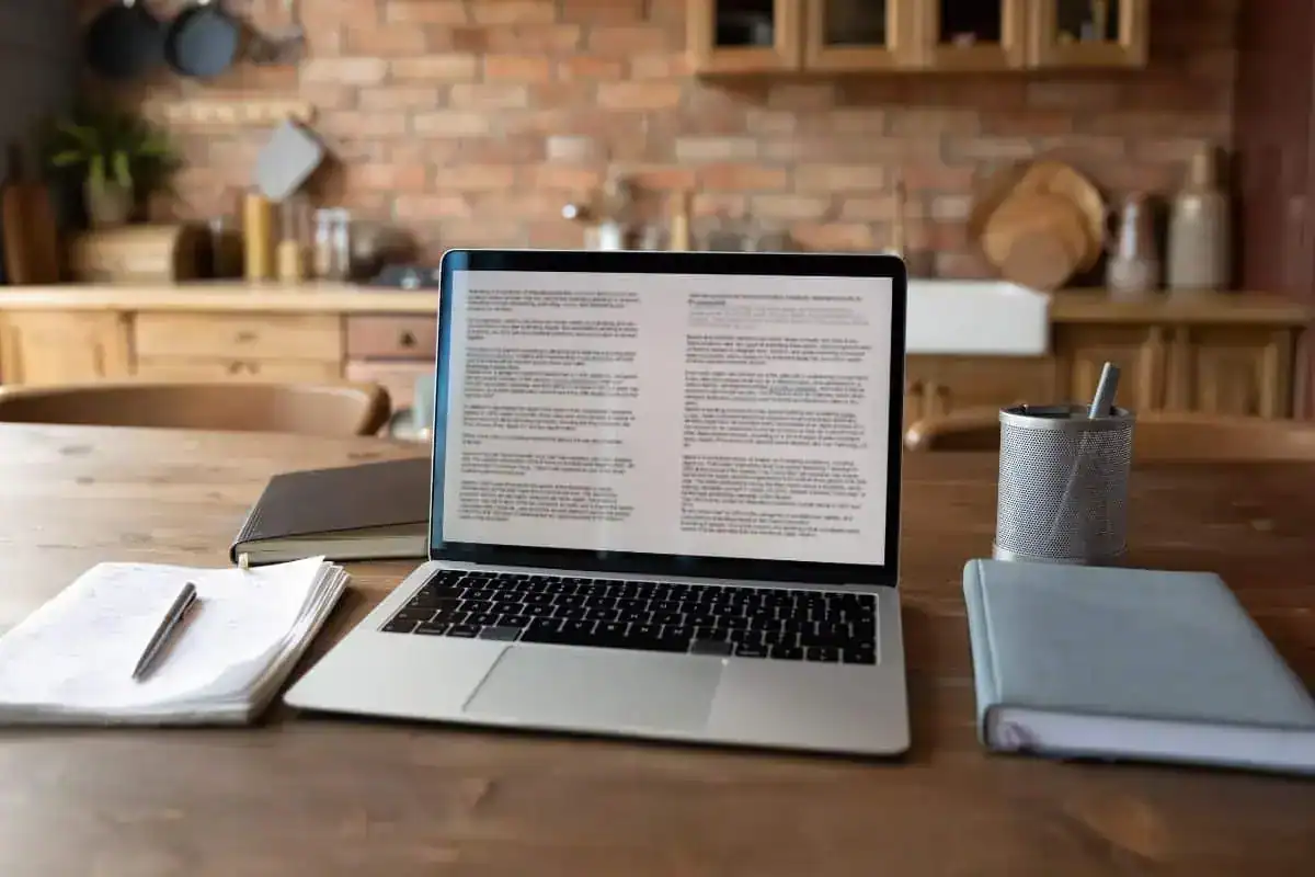 Close up modern laptop with electronic document on screen standing