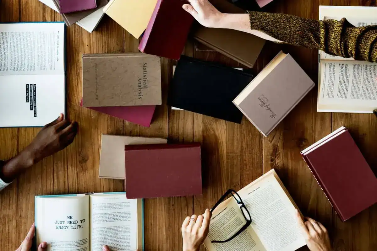People reading books at the library