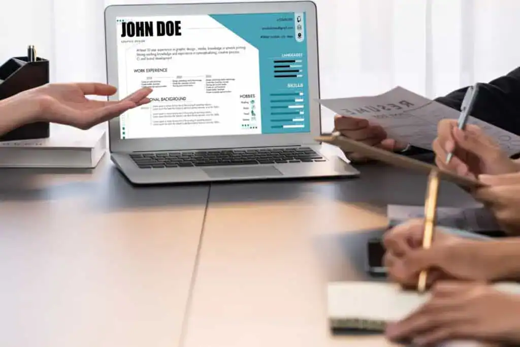 Candidate and interviewers discuss work experience