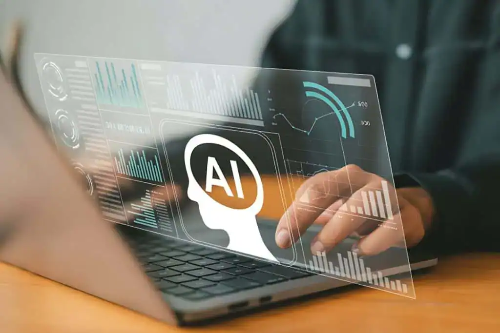 Human interacting with ai-powered data analytics on a laptop