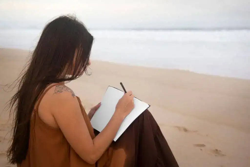 Sad woman near sea