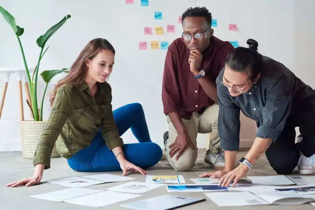 Floor planning and documents of business people in office