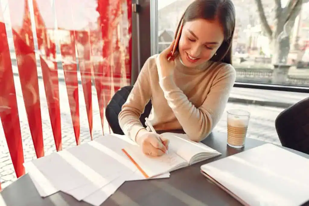 Businesswoman working in a cafe